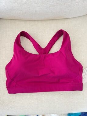 ATHLETA PINK ULTIMATE BRA IN SUPERSONIC size M NWT